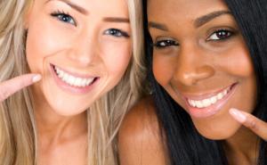 7744_dca-blog_teeth-whitening-two-women-pointing