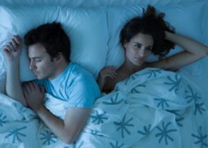8499_woman-man-sleeping-getty